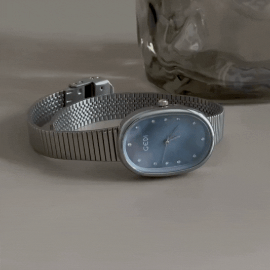 Azure Radiance Timepiece: Silver and Sky Blue Watch