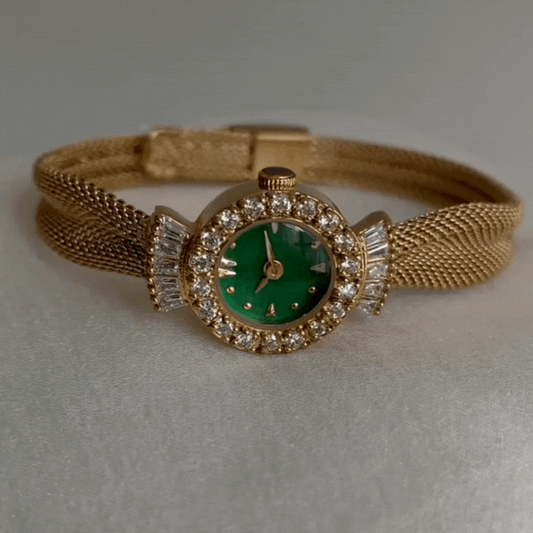 Regal Emerald Timepiece: Gold and Green Watch