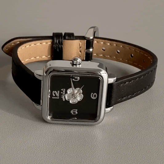 Black Leather & Silver Camellia Dial: Women's Quartz Watch
