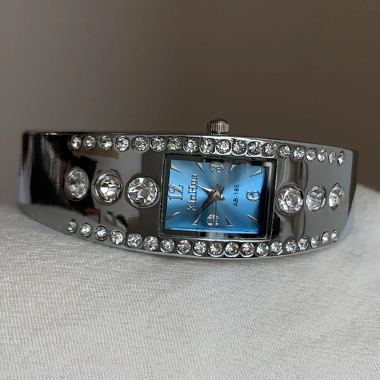 Silver Bangle Style with Blue Rectangular Dial and Crystal Accents Women’s Quartz Watch