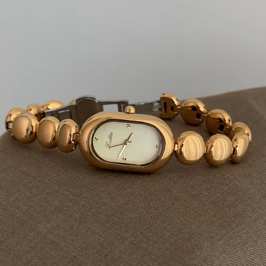 Narukvica od zlatne perlice: zlatni slučaj i ovalni biranje ženski kvarc sat