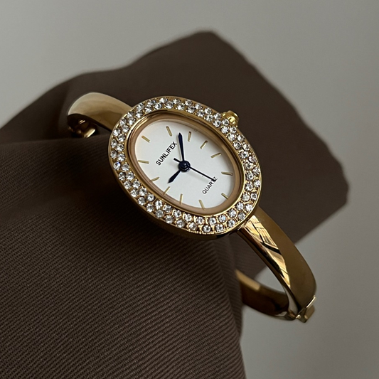 Luna Bath Gold - Oval Crystal Bangle horloge met wit gezicht
