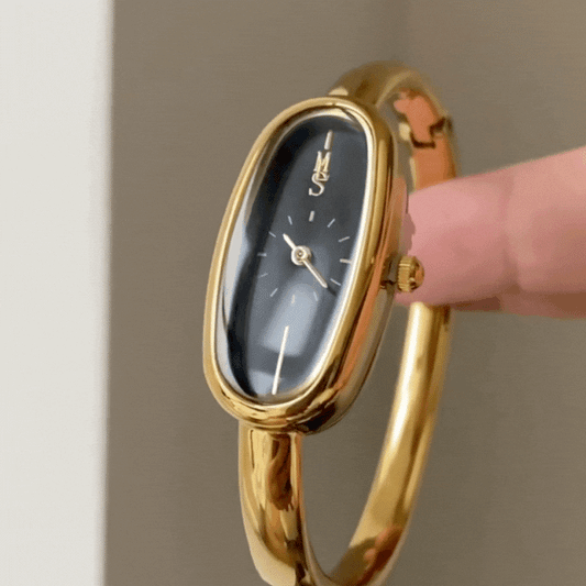 Gold Bangle Women’s Watch – Long Oval Black Dial | Elegant Quartz Design
