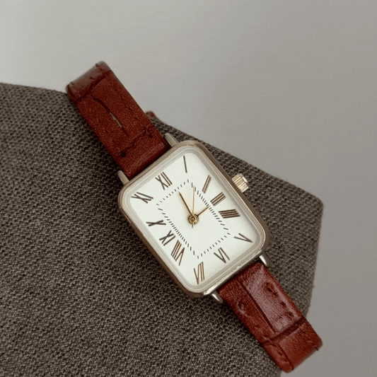 Roman Elegance – Vintage Brown Leather Strap Women’s Quartz Watch with Gold Rectangular Case and White Roman Dial