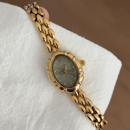 Élise Verde – Elegant Gold Bracelet Women’s Quartz Watch with Green Oval Dial