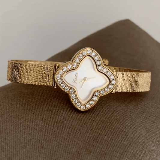Stellar Blanc – Luxury Gold Women’s Quartz Watch with White Dial and Crystal-Set Star Case