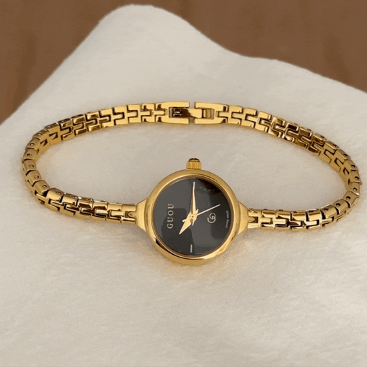 Minimal Elegance – Women’s Gold Slim Strap Black Small Round Quartz Watch