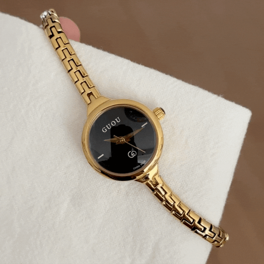Minimal Elegance – Women’s Gold Slim Strap Black Small Round Quartz Watch