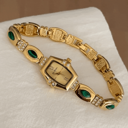 Elegant Gold-Tone Quartz Watch with Peacock Gemstone Accents and Alloy Strap