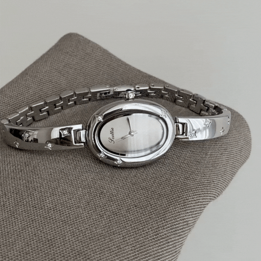 Stella Mist โ Womenโs Grey Sculpted Watch with Star Accents