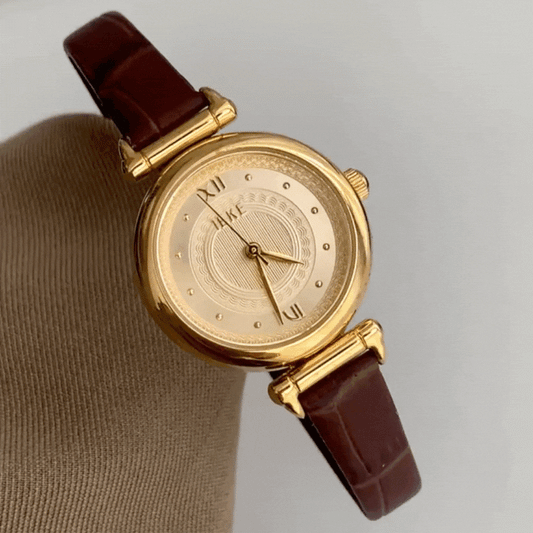 Vintage Charm – Brown Leather Strap Women’s Quartz Watch with Gold Round Retro Dial