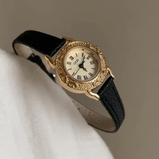 Regal Embossirani sat: Crni remen zlatni sat sat