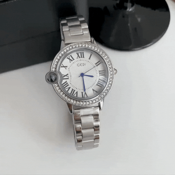 Lumière Pearl - Reloj de globo plateado con detalles de cristal