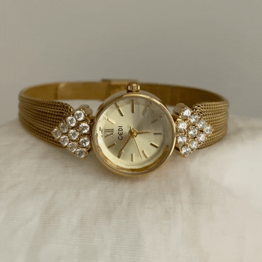 Golden Royal Timepiece: Round Dial Woven Strap Watch