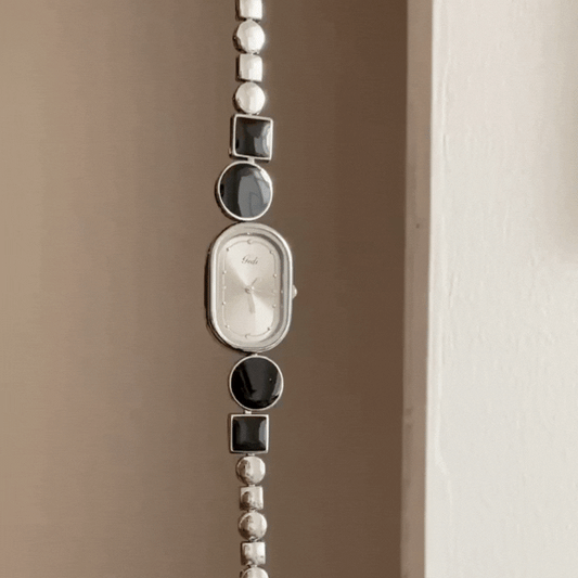 Montre à quartz à chaîne vintage au charme géométrique