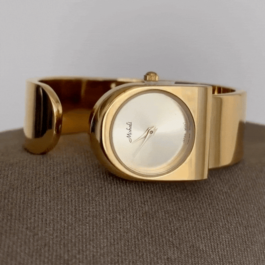 Golden Muse – Gold Wide Cuff Bracelet Women’s Quartz Watch with Round Dial