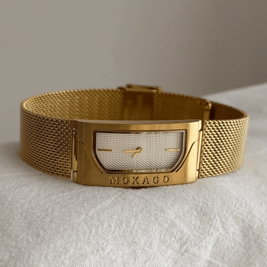 Gold Women’s Bangle White Rectangular Dial Quartz Watch Futuristic Minimalist Style – Aurora Edge
