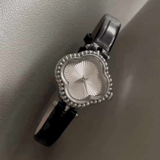Montre à quartz pour femme avec cadran argenté et bracelet en cuir noir – Élégante et chic