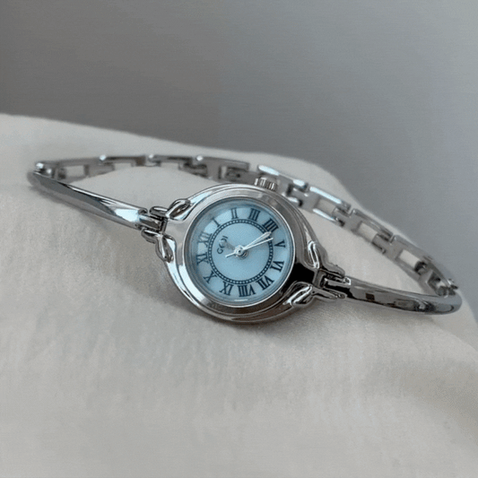 Montre à quartz avec mini cadran bleu et bracelet argenté