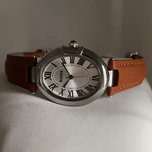 Montre à quartz pour femme, minimaliste et moderne, en cuir marron, avec boîtier argenté et cadran romain