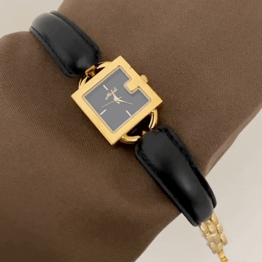 Montre à quartz en cuir noir Grace : boîtier carré doré