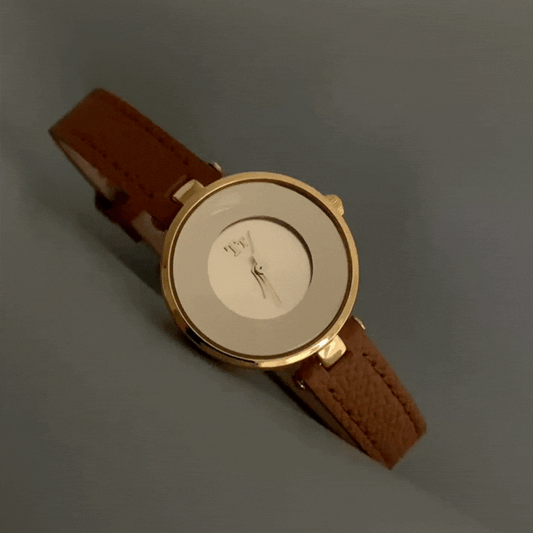 Amber Glow Timepiece: Brown Leather & Glass Dial Watch