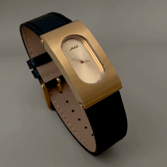 Montre à quartz ovale en cuir noir et or élégante