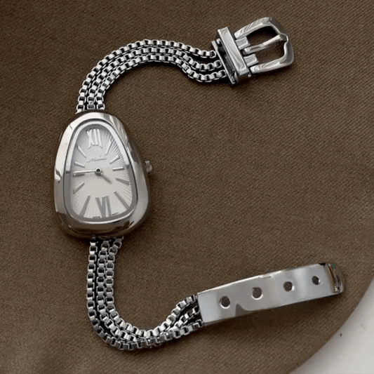 Montre à quartz Serpenti pour femme avec bracelet à pompon argenté et cadran blanc