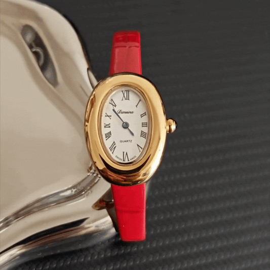 Montre à quartz pour femme avec bracelet en cuir rouge – Boîtier ovale doré et cadran blanc, élégante et classique