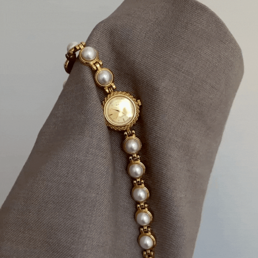 Pearl Majesty Timepiece: Elegant Round Dial Chain Bracelet Watch
