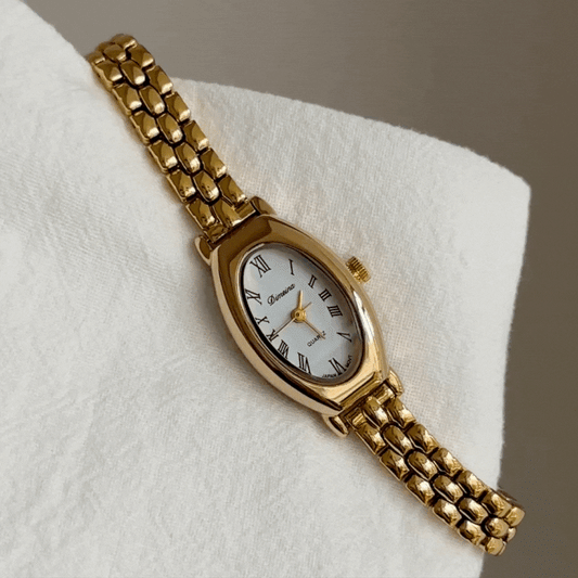 Elliptisk romersk ur: luxe vintage fransk guldur