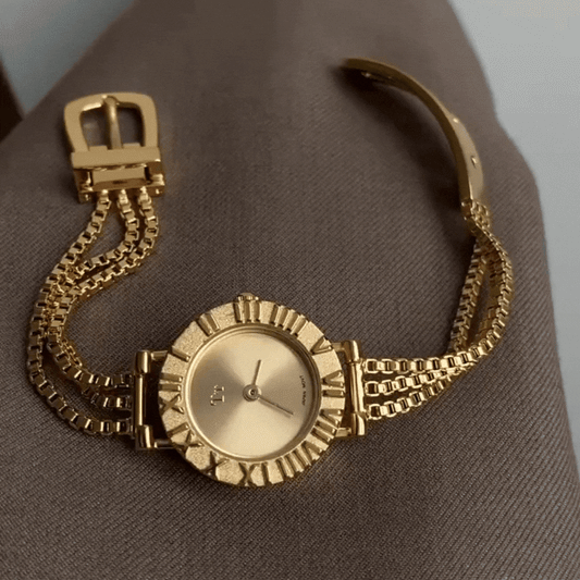 Montre à pampilles dorées : montre à quartz de luxe avec chaîne