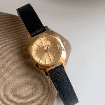 Onyx Luxe Timepiece: Black and Gold Leather Quartz Watch