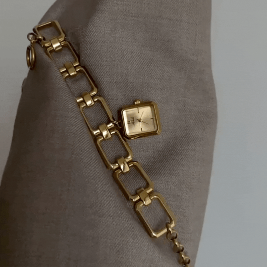 Montre à maillons dorés : montre à quartz à chaîne carrée creuse