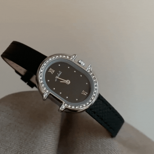 Montre à quartz ovale noire en argent onyx