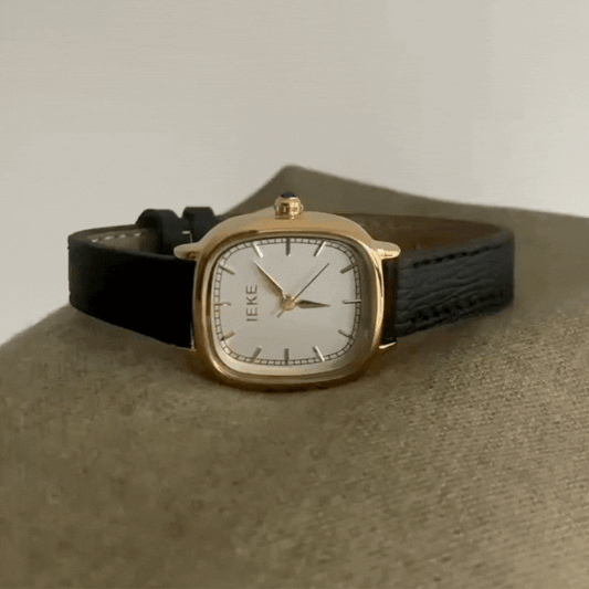 Obsidian luxe sat: crni i zlatni koĆŸni sat