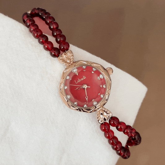 Elegant Glamour – Women’s Red Pearl Beaded Strap Gold Case Round Dial Quartz Watch