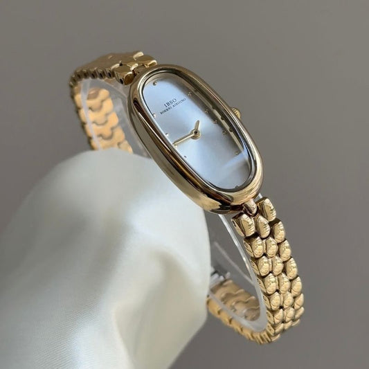 Vintage Petite Oval Gold Bracelet Watch with Minimalist Dial