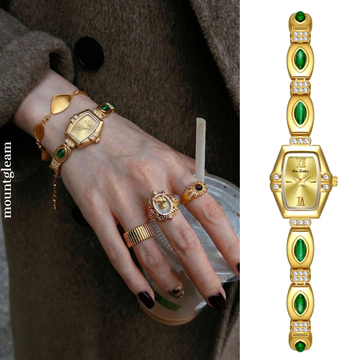 Elegant Gold-Tone Quartz Watch with Peacock Gemstone Accents and Alloy Strap