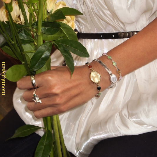 Elegance in Motion – Gold Oval Watch with Jade Bracelet