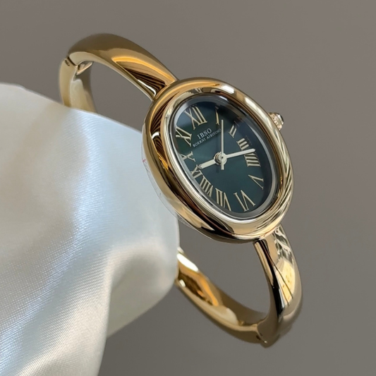 Petite Oval Charm：Black Oval Dial Watch – Gold Oval Bezel & Gold Stainless Steel Cuff Bangle
