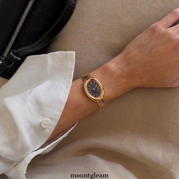 Gold Stretch Bracelet Women’s Quartz Watch – Mini Black Oval Dial