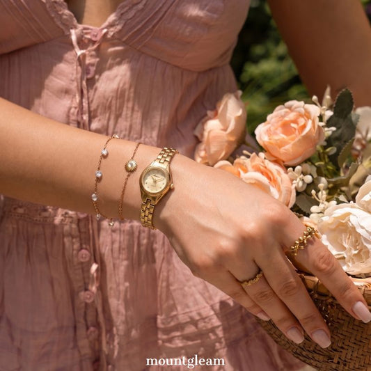 French-Inspired Gold Bracelet with Petite Round Dial: Lady's Quartz Watch