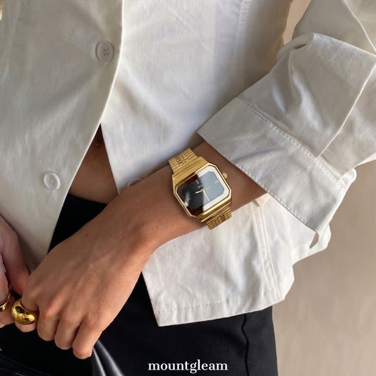 Luxuriöse Damen-Quarzuhr – goldenes breites Armband mit schwarzem rechteckigem Zifferblatt