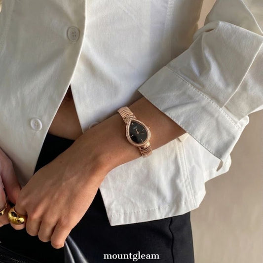 Mysterious Glamour: Black Teardrop Serpenti Dial with Gold Diamond Bezel & Strap