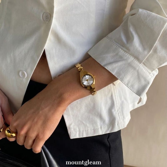 Metropolitan White Round Dial Watch – Gold Bezel & Gold Alloy Bracelet Quartz