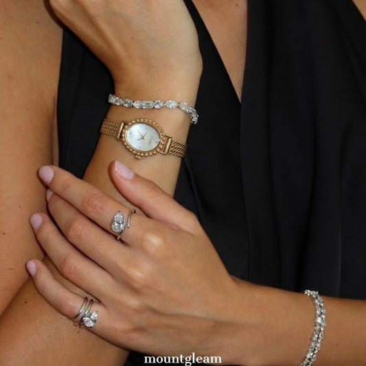 Luminous Pearl：White Mother-of-Pearl Oval Dial Watch – Gold Oval Bezel & Gold Stainless Steel Bracelet Quartzv