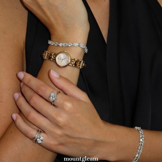 Gilded Warmth: Gold Round Dial Watch with Brown Gemstone Alloy Bracelet