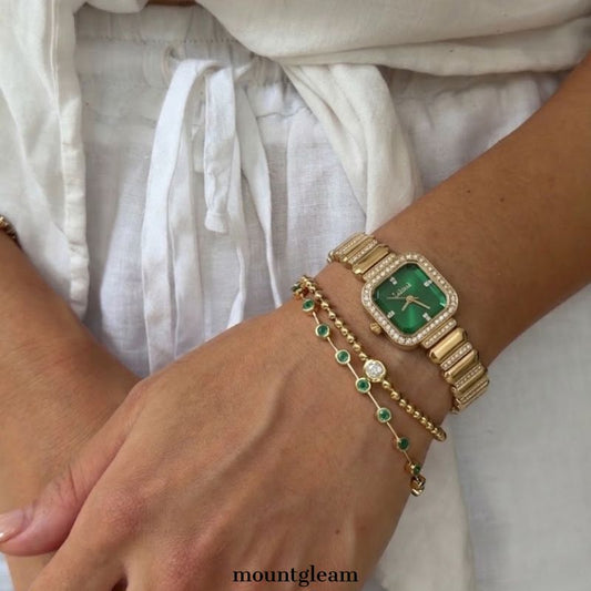 Opulent Radiance: Emerald Green Rectangular Diamond Dial Watch with Gold Diamond Bezel & Diamond Bracelet