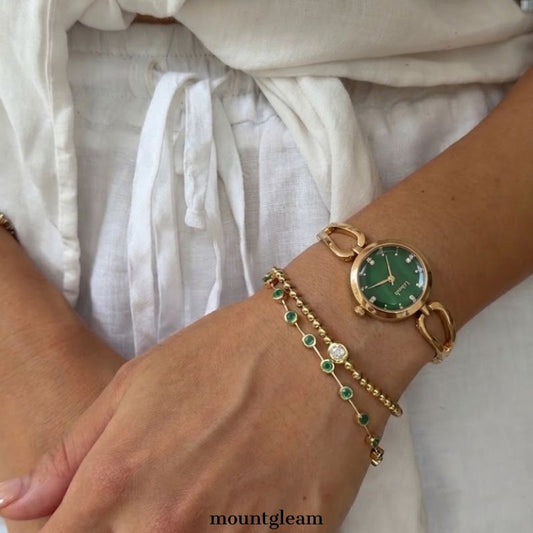 Gilded Elegance: Green Round Dial Watch with Gold Bezel & Bracelet